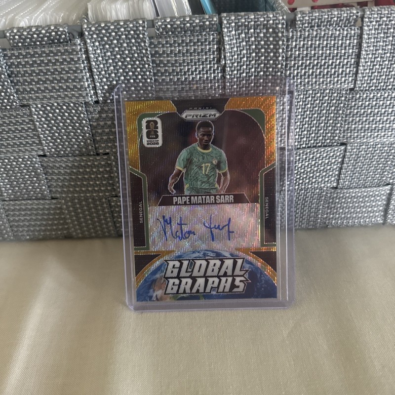 2026 Panini Prizm World Cup FIFA Pape Matar Sarr Global Graphs Gold Auto #9/10
