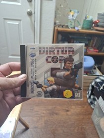 Virtua Cop (Sega Saturn, 1995) plus 3 more games.