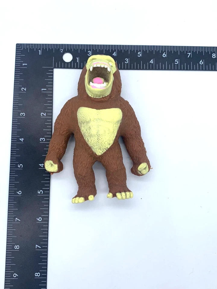 Liberación de Estrés y Ansiedad - Terapia de Manos Mono Marrón y Verde Foto 3 de 4