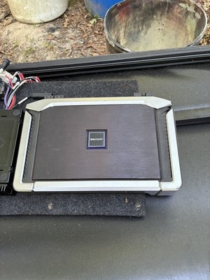 automobile radio, amplifier, and subwoofer