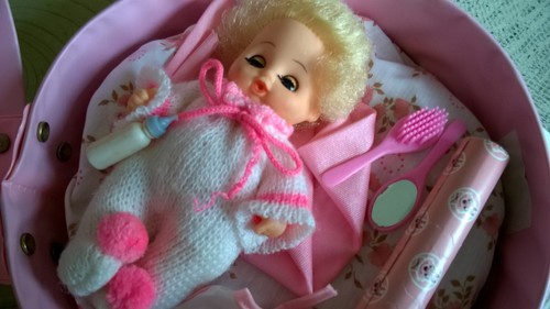 small vintage baby Marie doll in carrycase & accessories