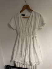 Eilly Bazar Size xS white cotton short-sleeved  crochet lace trim along the hem