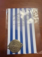 The Superior Labor brass charm - lucky ties