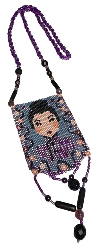 Hhandmade glass beaded amulet necklace featuring a geisha design 24"