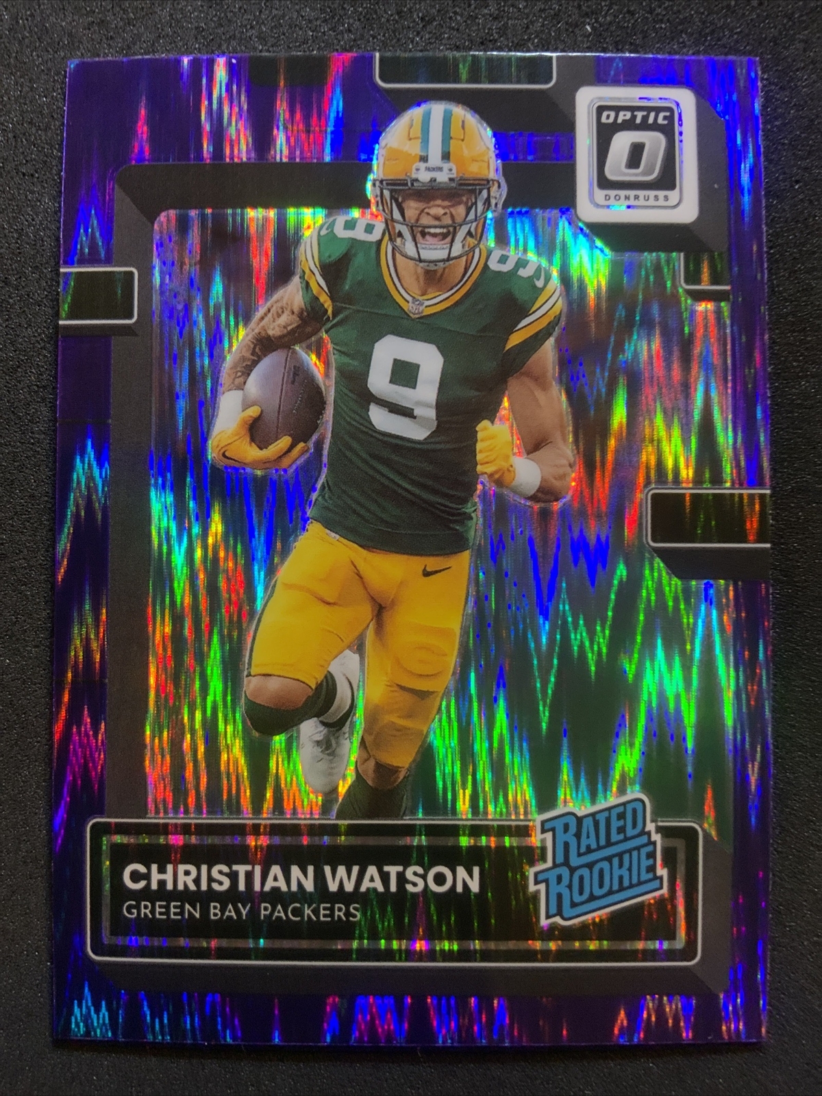 2022 Christian Watson Donruss Optic Purple Shock Prizm Rated Rookie #219 Packers
