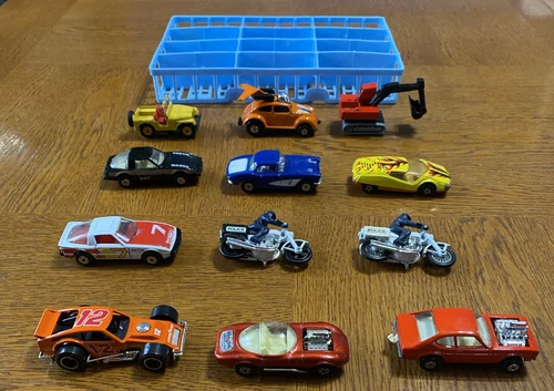 Lot of 12 Vintage Matchbox Cars, Trucks & Motorcycles In Blue Plastic Car Holder