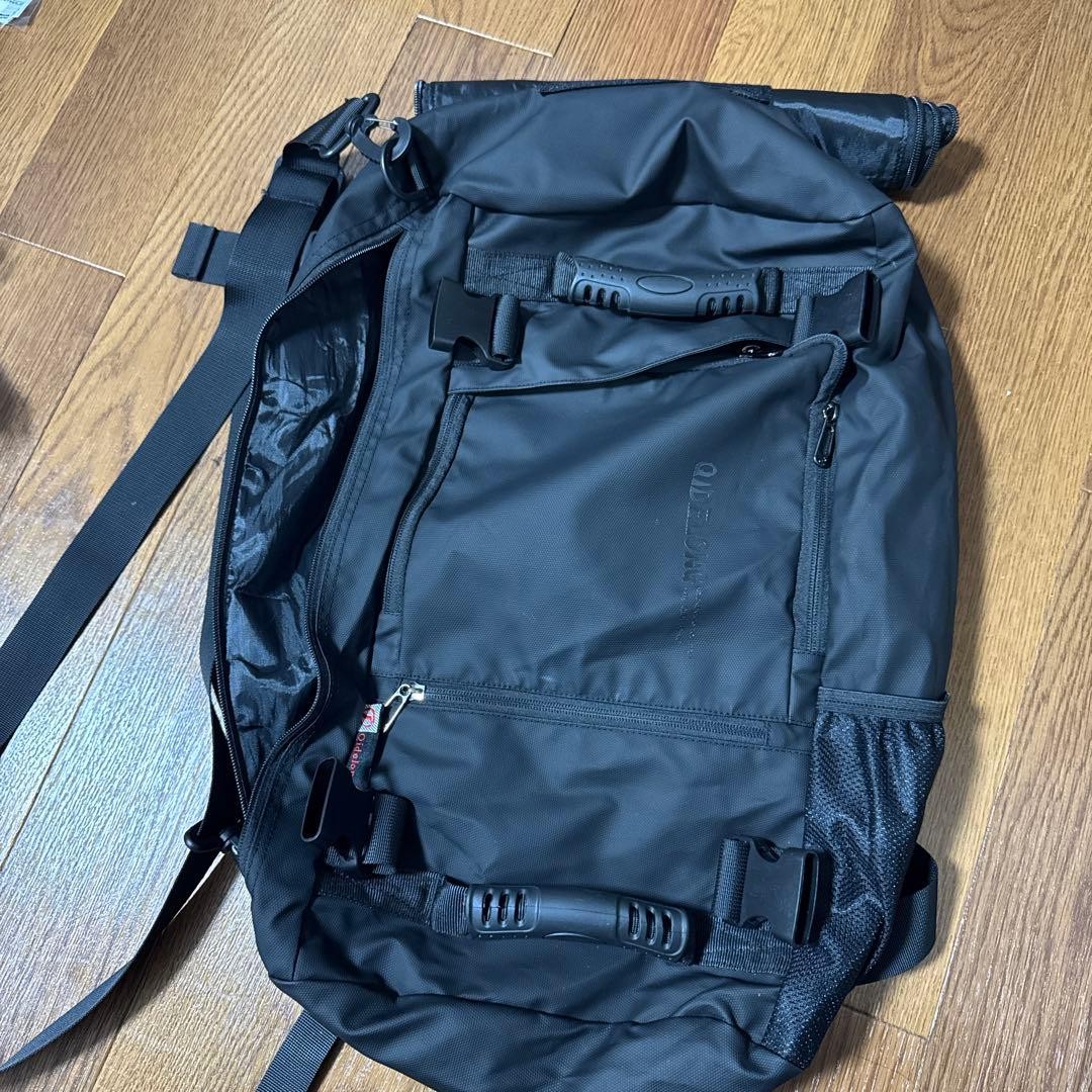 Black nylon backpack with multifunctional pockets… - image 1