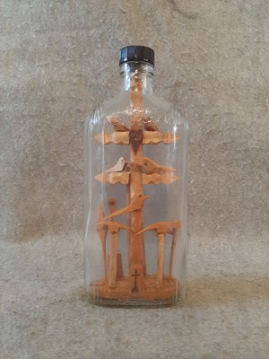 Vintage Carved Wood Folk Art Bird Tree Decoys in Embossed Glass Bottle Art Deco