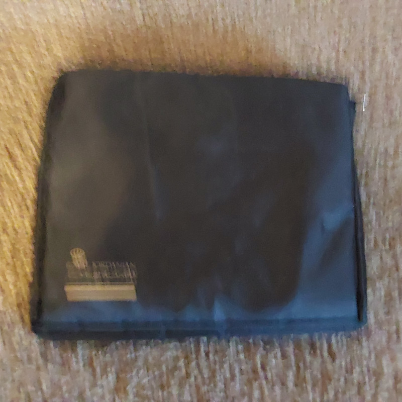 NYLON CARRY ON BAG INSIDE A SMALL POUCH  ROYAL JORDANIAN