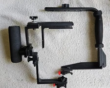 Stroboframe + Newton flip 35mm camera flash brackets.  Benefits Charity 100%
