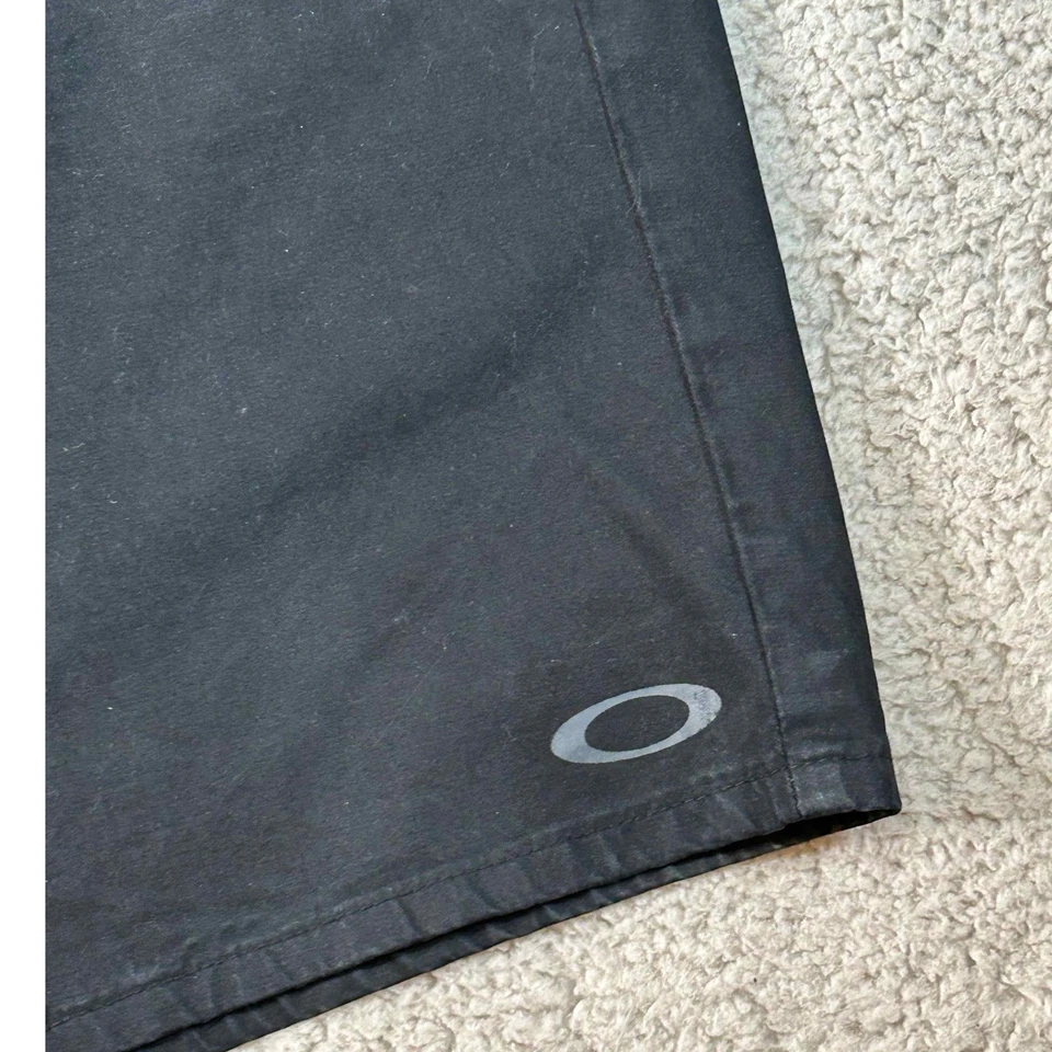 Pantalones cortos chinos informales negros Oakley para hombre talla 32 Foto 2 de 4