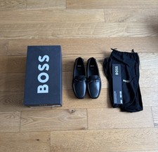 BOSS leather driver moccasins with a bow trim in black