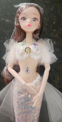 Mermaid doll in sparkling white