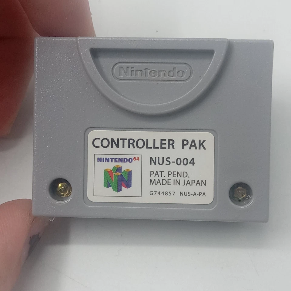 Paquete de mandos Nintendo 64 NUS-004 N64 con folleto de instrucciones sin probar Foto 2 de 4
