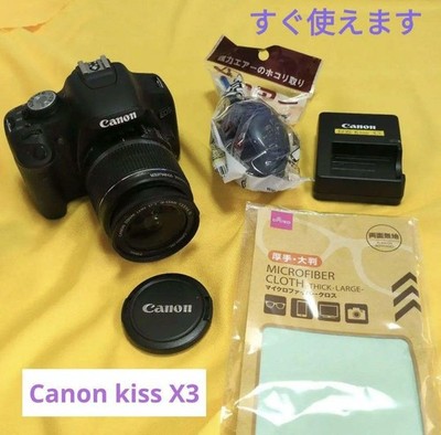 Canon EOS Kiss X3 DSLR Camera with 18-55mm Lens and 4GB SD Card Bundle