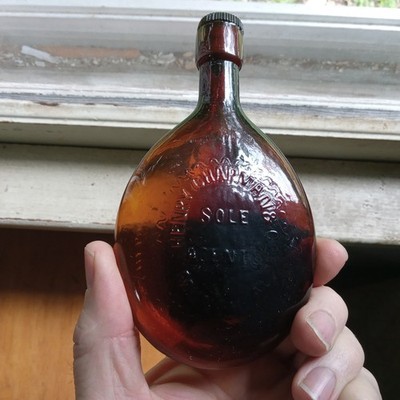 1860s PRETTY RED AMBER HENRY CHAPMAN MONTREAL POCKET WHISKEY FLASK