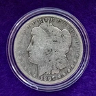 1897 O Morgan Silver Dollar 90% Silver In Capsule Good