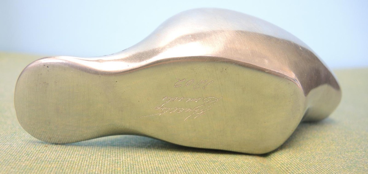 Two Vintage Cast Aluminum Hoselton Canada Sculptures