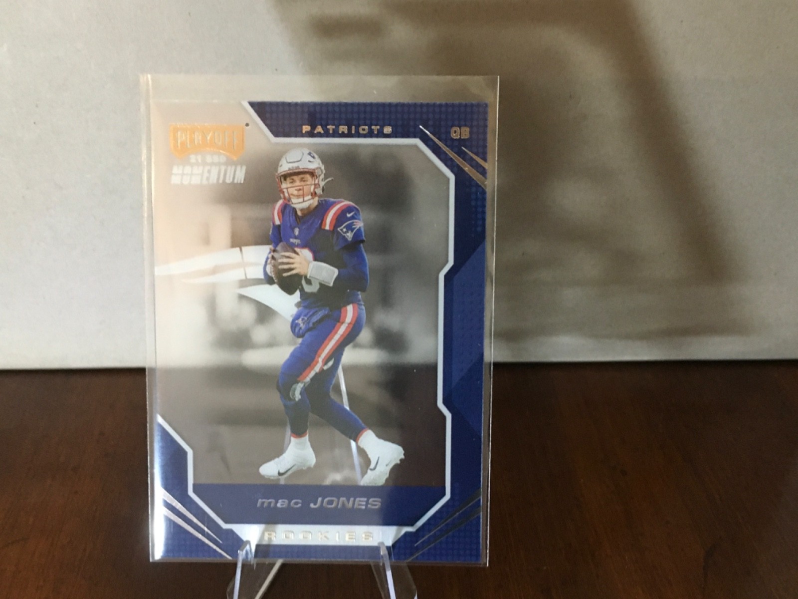 2021 Panini Chronicles - Playoff Momentum Rookies Mac Jones #PMR-9 (RC)