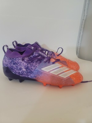 purple and orange cleats