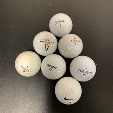 Mixed Lot Of 7 Used Golf Balls -Titleist Nike Top Flight Pinnacle Strata Precept