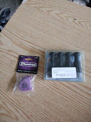 Dunlop 418P 1.14 Tortex Standard 12-Pack Picks Bonus Gloves And Toner For Finger