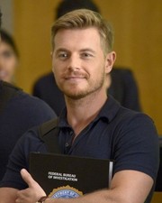 Quantico Unsigned photo - Rick Cosnett - Donation to Cancer Charity *239