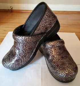 gold dansko clogs