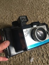 POLAROID LAND CAMERA INSTANT " THE CLINCHER " TAKES FLASH CUBES