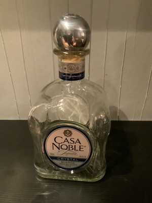 Casa Noble crystal , angeo tequila empty bottle