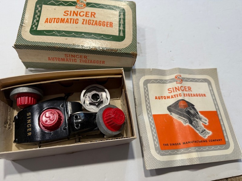 vintage SINGER SEWING MACHINE AUTOMATIC ZIGZAGGER in original box w/parts?