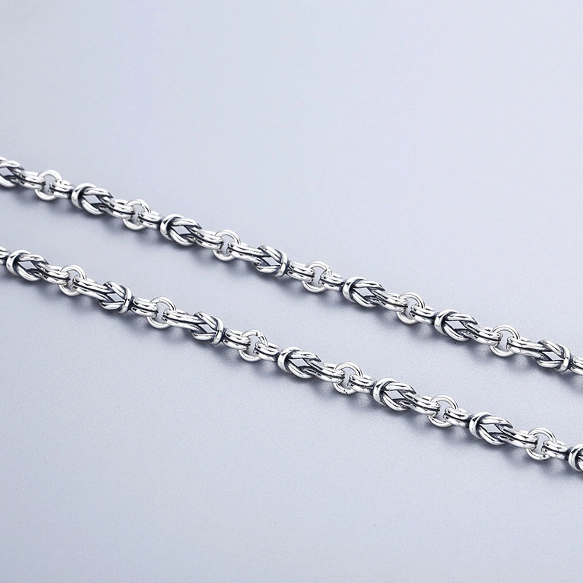 Silver rope deals knot necklace