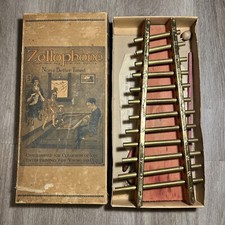 CELÓFONO VINTAGE Ninguno mejor afinado Marca Reg Us Pat Office en CAJA Y papeles