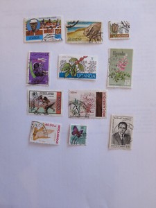 11 Africa used postage stamps: Uganda, Mozambique, Tanzania, Egypt, Libya, Maroc