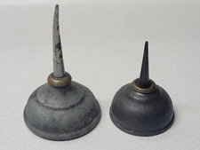 2 Unmarked Oilers, (1) 3 3/8 and (1) 2 1/2-inch-tall sewing machine oil can