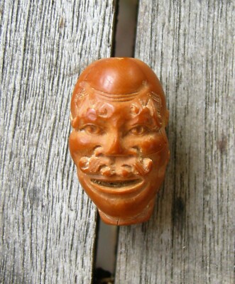 Chinese Peach Pit Carving Bead in the Shape of a Western Man's Head c. 1935