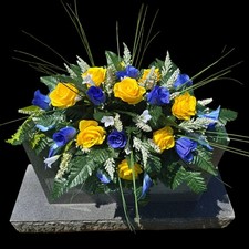 BLUE AND YELLOW HEADSTONE SADDLE WITH YELLOW ROSES & BLUE LILY'S FOR CEMETERY