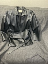 vintage Worthington women's black leather jacket featuring a belted waist