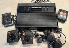 Atari 2600 Bundle Console, 4 Games, 2 Joystic...