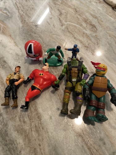 Lot of 7 Teenage Mutant Ninja Turtles 