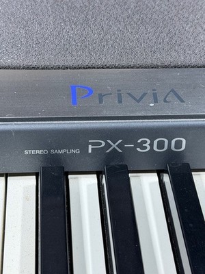 Casio Privia PX-300 Digital Piano, stand, accessories. Needs a new