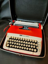 red, portable Smith Corona Galaxie typewriter with Cursive / Handwritten Script thumbnail