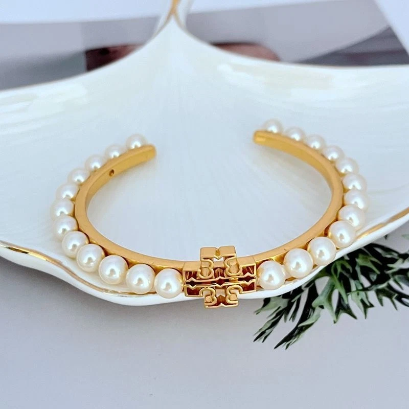 ¡Nuevo! Brazalete brazalete Tory Logo Perla Marfil OS con bolsa para joyas Foto 2 de 4