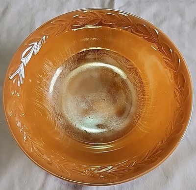This is a vintage Fire King Peach Luster Laurel Leaf serving bowl