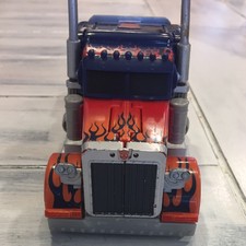 optimus prime g1 self transforming toy