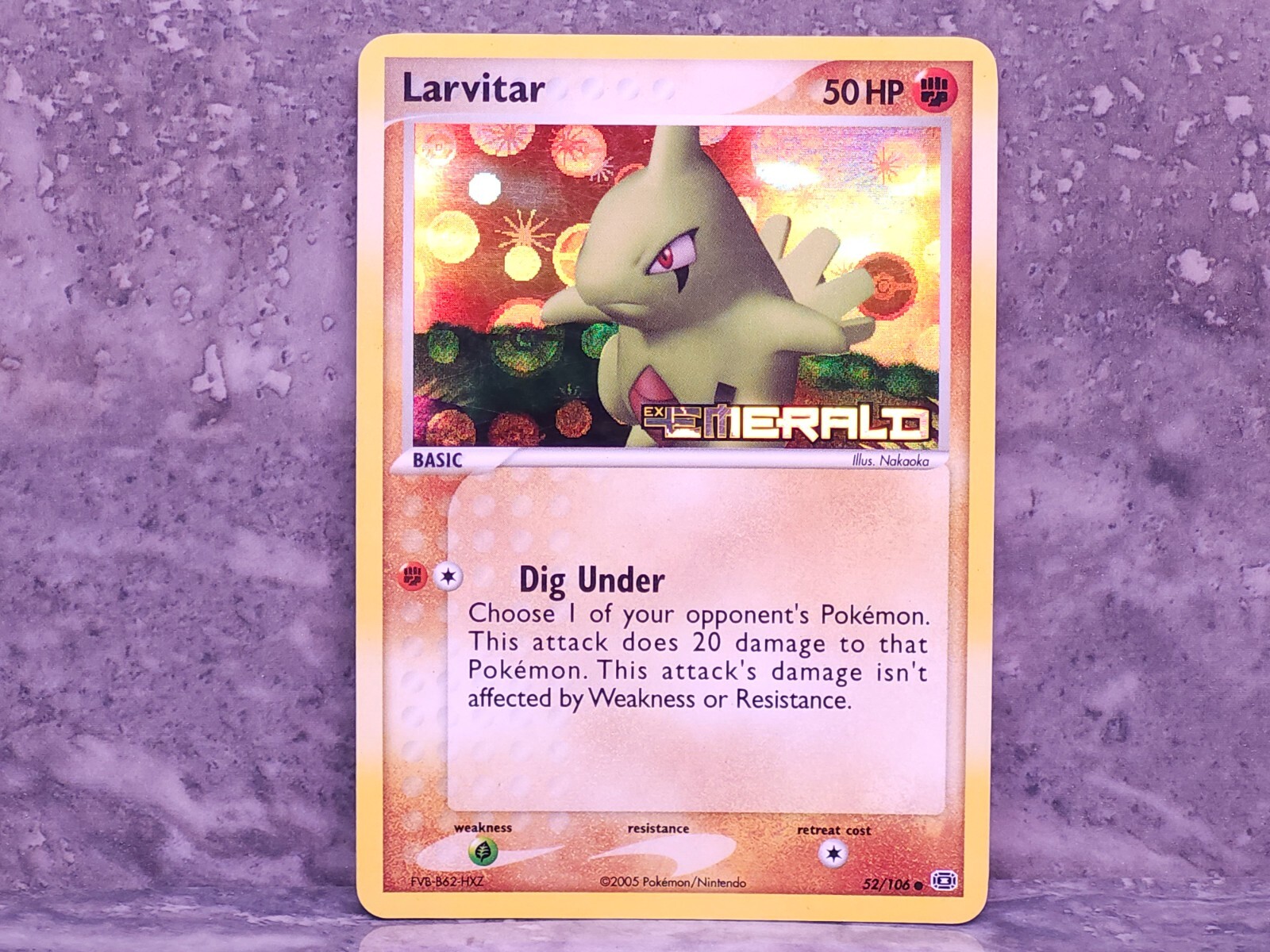 Larvitar 52/106 - Ex Emerald - Reverse Holo Common - Lightly Played