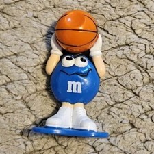 Mini Blue M&M Shooting A Basketball 2.5 Inches Tall Blue