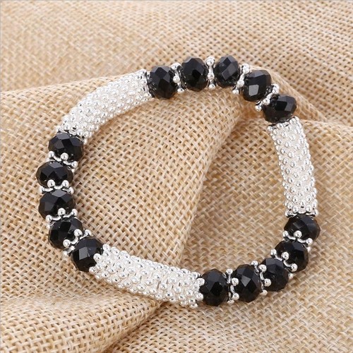 CRYSTAL BLACK RONDELLES AND SILVER PLATED DAISY BEADS STRETCH BRACELET - Picture 3 of 6