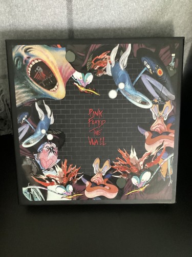 Pink Floyd, “The Wall” immersion box set, 6 CD’s, 1 DVD, coasters, poster,& more