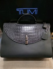 TUMI LEATHER BRIEFCASE HOLDS 14IN LAPTOP